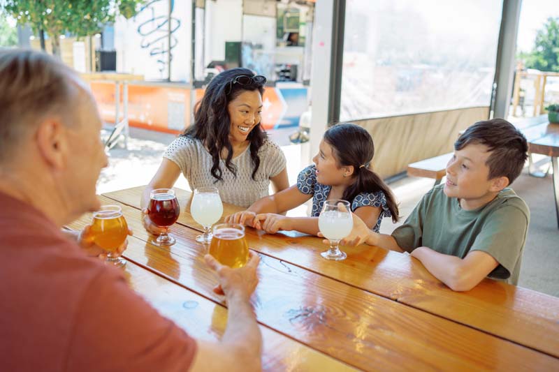 Family having cold drinks together